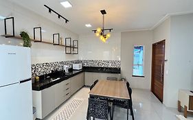 Casa confortável com ar no litoral